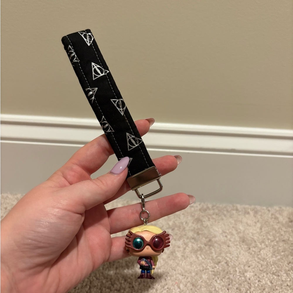Harry Potter Deathly Hallows Wristlet with Luna Lovegood Mini Funko Keychain